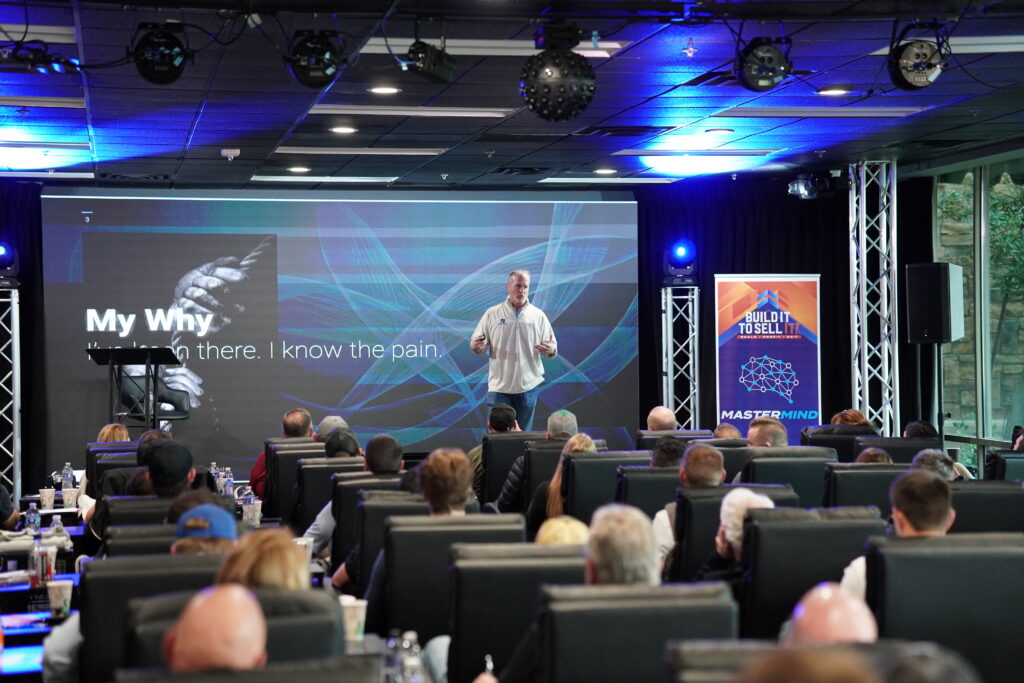 Lance Bachmann presenting a “My Why” slide during a Build It To Sell It Mastermind session.